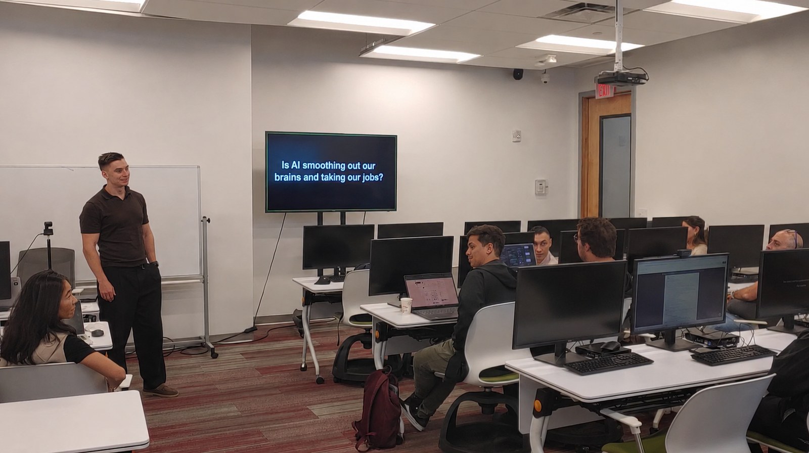 Ihor Parinov discussing AI and the future of work with MS AI students at Atlantis University